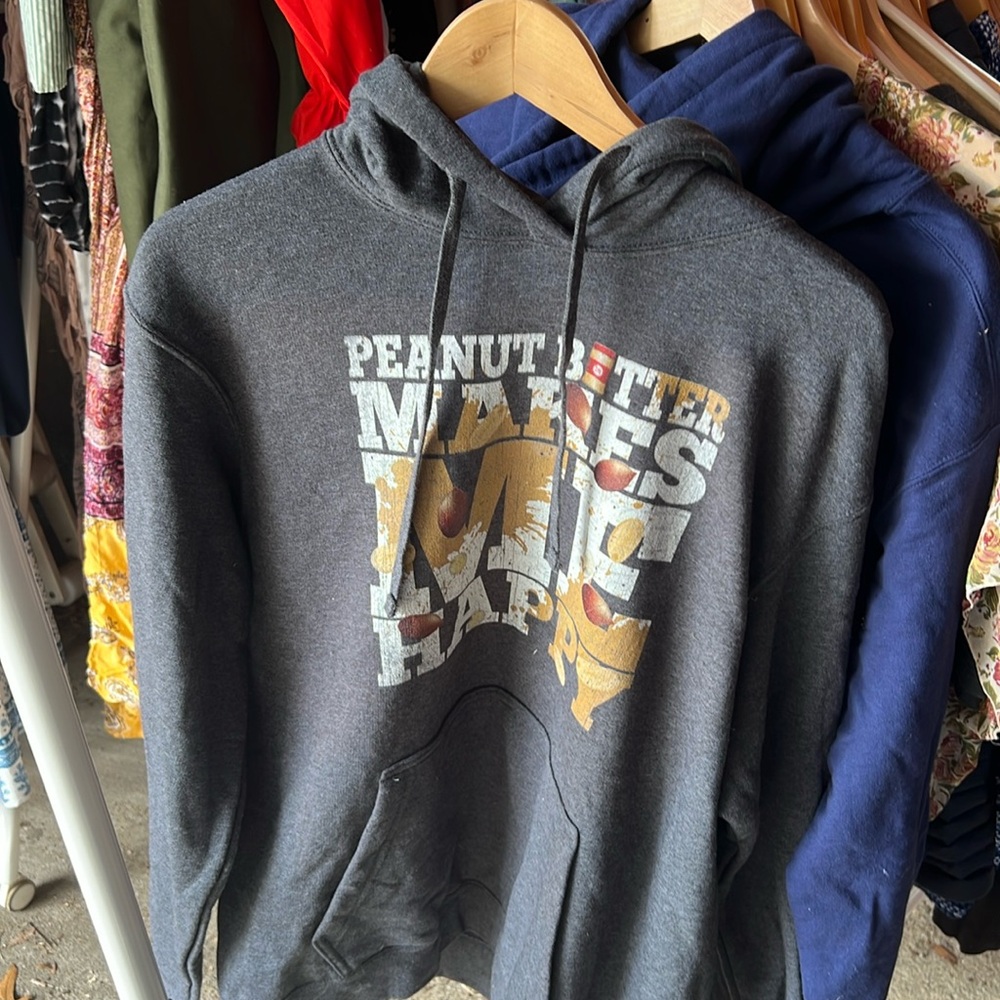 Gray, large sweatshirt with words saying “Peanut Butter makes me happy”